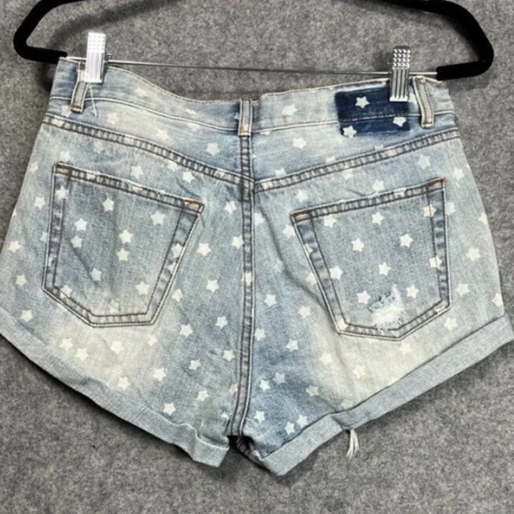 Superdown Revolve Kenzie Star Denim Shorts in Light Blue Wash​​​​​​​​​​​​